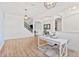 Open living room with hardwood floors and modern lighting at 913 Buckhurst Dr, Spring Hill, FL 34609