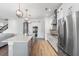 Modern kitchen with stainless steel appliances and white cabinets at 913 Buckhurst Dr, Spring Hill, FL 34609