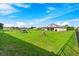 Spacious backyard with playground and privacy fence at 913 Buckhurst Dr, Spring Hill, FL 34609