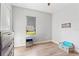 Bright bedroom featuring wood-look floors and ample space at 913 Buckhurst Dr, Spring Hill, FL 34609