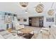 Bonus room with wet bar, sectional sofa and barn door at 913 Buckhurst Dr, Spring Hill, FL 34609
