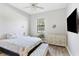 Charming bedroom with a queen bed and dresser at 913 Buckhurst Dr, Spring Hill, FL 34609