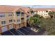 Exterior view of the condo building and parking area at 10764 70Th Ave # 3305, Seminole, FL 33772