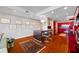 Open living area with hardwood floors, modern decor, and kitchen access at 1 Beach Se Dr # 2007, St Petersburg, FL 33701
