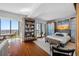 Main bedroom with hardwood floors, large windows, and city views at 1 Beach Se Dr # 2007, St Petersburg, FL 33701