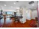 Open concept living area with hardwood floors and kitchen views at 1 Beach Se Dr # 2007, St Petersburg, FL 33701