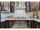 Modern kitchen with gas cooktop and granite countertops at 3910 Oldbrook Ln, Plant City, FL 33566