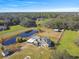 Single-story house with a large yard and pond at 3910 Oldbrook Ln, Plant City, FL 33566