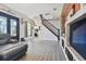 Bright living room with hardwood floors and a staircase at 3910 Oldbrook Ln, Plant City, FL 33566