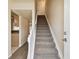 Staircase leading to upper level with carpet at 3825 Pompano Se Dr, St Petersburg, FL 33705