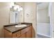 Bathroom with vanity and dark countertop at 3825 Pompano Se Dr, St Petersburg, FL 33705