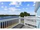 Spacious balcony with water and treetop views at 3825 Pompano Se Dr, St Petersburg, FL 33705