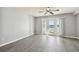 Living room with water view and vinyl plank flooring at 3825 Pompano Se Dr, St Petersburg, FL 33705