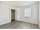 Bedroom with closet and vinyl plank flooring at 3825 Pompano Se Dr, St Petersburg, FL 33705