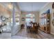 Elegant dining room, hardwood floors, and decorative hutch at 246 Old Oak Cir, Palm Harbor, FL 34683