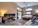 Main bedroom with king-size bed and sliding doors to backyard at 246 Old Oak Cir, Palm Harbor, FL 34683