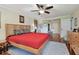 Spacious bedroom with hardwood floors, ceiling fan and a view at 36750 Us Highway 19 N # 05213, Palm Harbor, FL 34684
