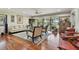 Bright living room with hardwood floors and view to backyard at 36750 Us Highway 19 N # 05213, Palm Harbor, FL 34684