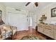 Bright home office features hardwood floors, built-in shelving, and ample natural light at 36750 Us Highway 19 N # 05213, Palm Harbor, FL 34684
