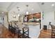 Modern kitchen with granite countertops and stainless steel appliances at 36750 Us Highway 19 N # 05213, Palm Harbor, FL 34684