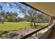 Scenic balcony view of the golf course and lake at 36750 Us Highway 19 N # 05213, Palm Harbor, FL 34684