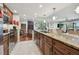 Modern kitchen with granite countertops and stainless steel appliances at 36750 Us Highway 19 N # 05213, Palm Harbor, FL 34684
