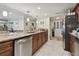 Modern kitchen with granite countertops and stainless steel appliances at 36750 Us Highway 19 N # 05213, Palm Harbor, FL 34684