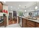 Modern kitchen with granite countertops and stainless steel appliances at 36750 Us Highway 19 N # 05213, Palm Harbor, FL 34684