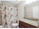 Clean bathroom with shower/tub combo and granite vanity at 2721 Garden Falls Dr, Brandon, FL 33511