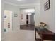 Bright entryway with wood flooring and view to living room at 2721 Garden Falls Dr, Brandon, FL 33511