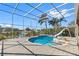 Inviting screened pool area with a slide overlooking the canal at 1104 Kingfish Pl, Apollo Beach, FL 33572