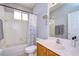 Bright bathroom featuring a tub, marble countertops, a shower, and sleek fixtures at 15501 Pepper Pine Ct, Land O Lakes, FL 34638
