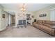 Combined dining and living area with neutral decor at 2293 Swedish Dr # 43, Clearwater, FL 33763