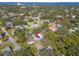 Single-Gathering home with a spacious backyard and large tree near the water at 2820 W Leila Ave, Tampa, FL 33611