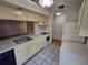 Bright kitchen features ample cabinetry and updated appliances at 2672 Arjay Ct, Palm Harbor, FL 34684