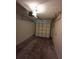 Single car garage with an automatic garage door opener at 2672 Arjay Ct, Palm Harbor, FL 34684