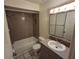 Well-maintained bathroom with a shower/tub and updated fixtures at 2672 Arjay Ct, Palm Harbor, FL 34684