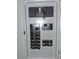 Indoor electrical panel with multiple circuit breakers at 2672 Arjay Ct, Palm Harbor, FL 34684