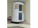 Rheem brand water heater located in a garage corner at 2672 Arjay Ct, Palm Harbor, FL 34684