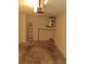 Garage with storage shelving, water heater, and ladder at 2672 Arjay Ct, Palm Harbor, FL 34684