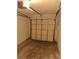 Empty single car garage with automatic garage door opener at 2672 Arjay Ct, Palm Harbor, FL 34684