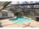 Inviting kidney-shaped pool with screened enclosure at 505 S 56Th St, Tampa, FL 33619