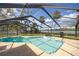 Relaxing pool area with screened enclosure and river views at 505 S 56Th St, Tampa, FL 33619