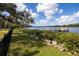 Waterfront backyard with private dock and lush landscaping at 505 S 56Th St, Tampa, FL 33619