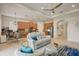 Spacious living room with a comfortable couch and an open floor plan at 1804 Pacific Dunes Dr, Sun City Center, FL 33573