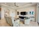 Relaxing living room with recessed lighting and a large TV at 1804 Pacific Dunes Dr, Sun City Center, FL 33573