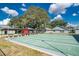 Community shuffleboard courts with covered seating at 6703 Pistachio St, Zephyrhills, FL 33542