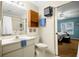Clean bathroom with vanity, toilet, and walk-in shower at 6703 Pistachio St, Zephyrhills, FL 33542
