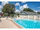 Inviting community pool with ample lounge space at 6703 Pistachio St, Zephyrhills, FL 33542