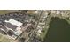 Aerial showing home's location near a lake and community at 1009 Cherry Hills Dr, Sun City Center, FL 33573